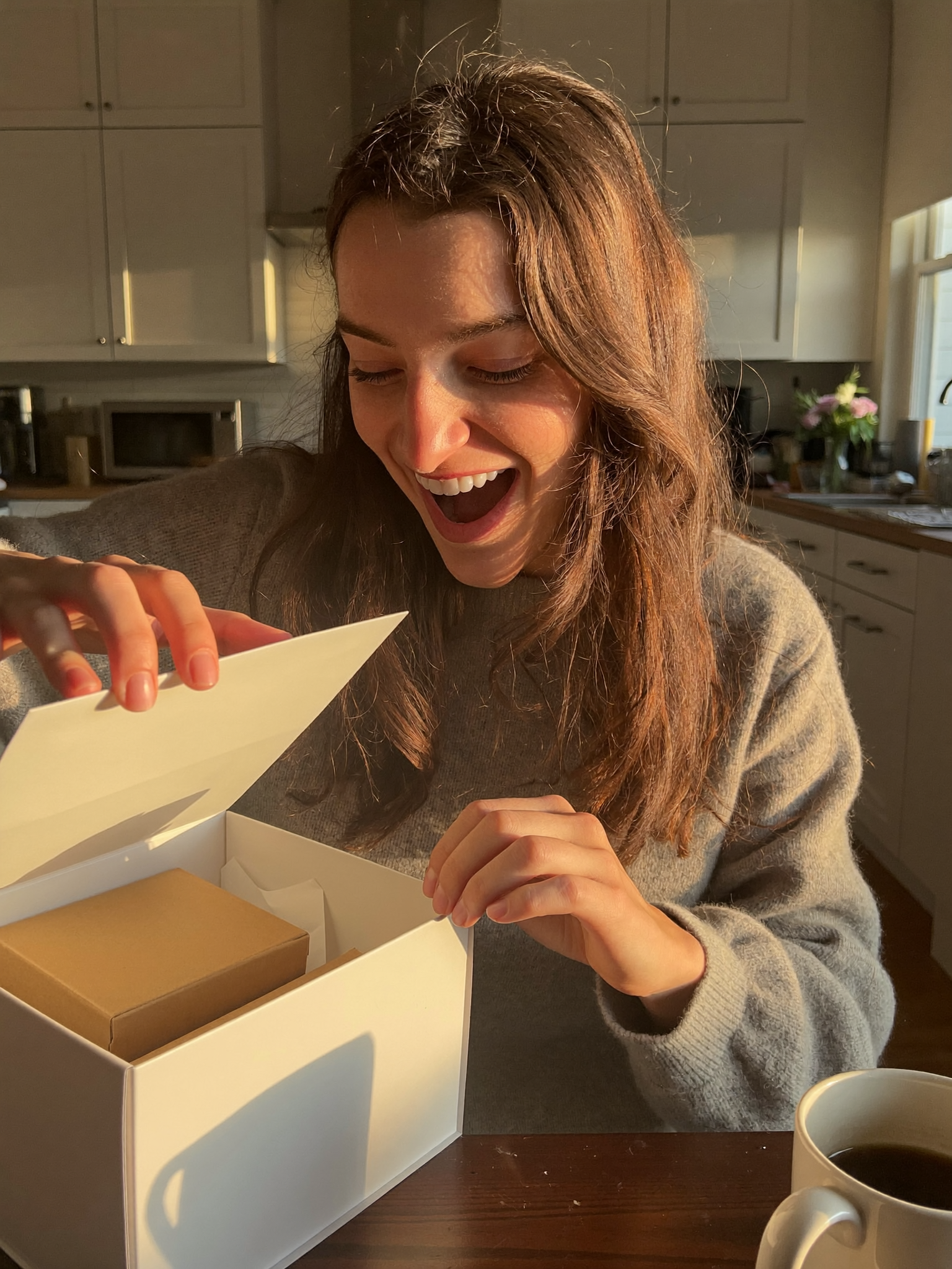 Customer review photo: opening a gift box with delight